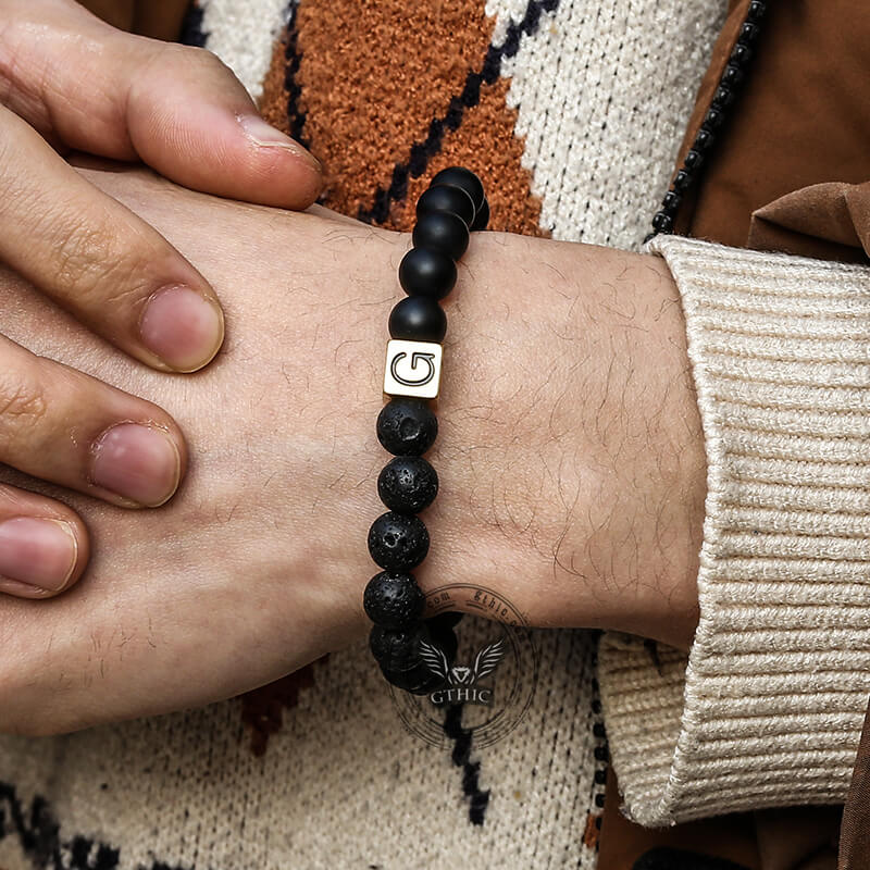 Pulsera de acero inoxidable con 26 cuentas del alfabeto inglés