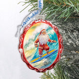Coastal Christmas Ornaments  Santa on the Surfboard Keepsake Glass Ornaments by G. Debrekht - Coastal Holiday Decor - 777392
