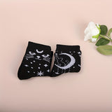 2 pares de calcetines con estampado de estrellas y lunas, cómodos y transpirables, medias de tubo medio para mujer.