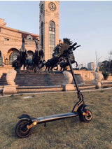 Patinete plegable de doble tracción con neumáticos anchos