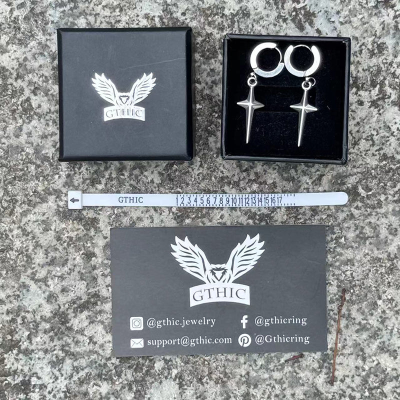 Pendientes de aro de acero inoxidable con estrella de 4 puntas