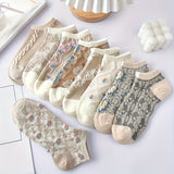 9 pares de calcetines tobilleros de corte bajo con estampado floral vibrante. Tejido de poliéster suave, transpirable y cómodo. Lavable a máquina. Estilo retro. Medias y calcetería para mujer.
