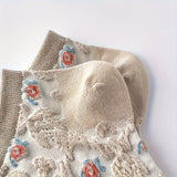 9 pares de calcetines tobilleros de corte bajo con estampado floral vibrante. Tejido de poliéster suave, transpirable y cómodo. Lavable a máquina. Estilo retro. Medias y calcetería para mujer.