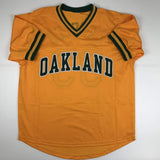 Autographed/Signed Jose Canseco Oakland Yellow Baseball Jersey JSA COA