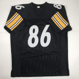 Camiseta de fútbol americano negra de Pittsburgh autografiada/firmada por Hines Ward (JSA COA)