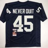 Camiseta de fútbol americano universitario azul autografiada/firmada de Rudy Ruettiger Never Quit Notre Dame JSA COA