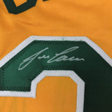 Framed Autographed/Signed Jose Canseco 35x39 Oakland Yellow Baseball Jersey JSA COA