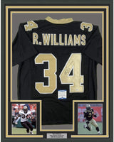 Camiseta de fútbol negra de Nueva Orleans, enmarcada, autografiada y firmada por Ricky Williams, 35 x 39, Beckett BAS COA