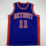 Camiseta de baloncesto azul de Detroit de Isiah Thomas autografiada/firmada Beckett BAS COA