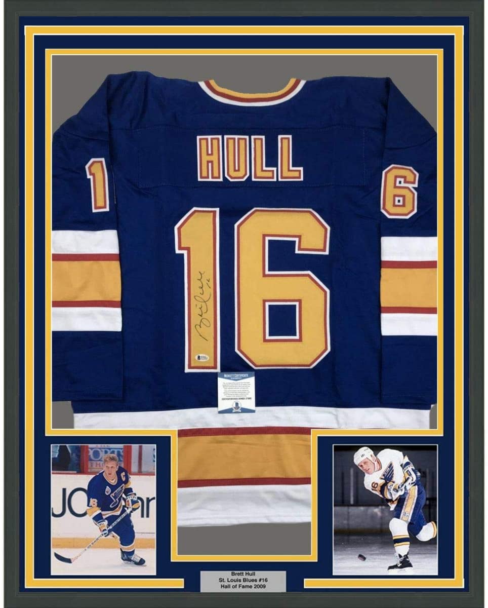 Camiseta de hockey azul de St. Louis de 35 x 39, enmarcada, autografiada y firmada por Brett Hull. Beckett BAS COA.
