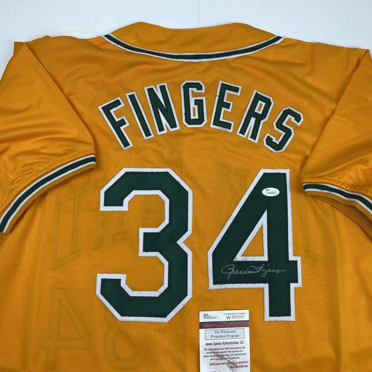 Camiseta de béisbol amarilla de Oakland autografiada y firmada por Rollie Fingers (JSA COA)