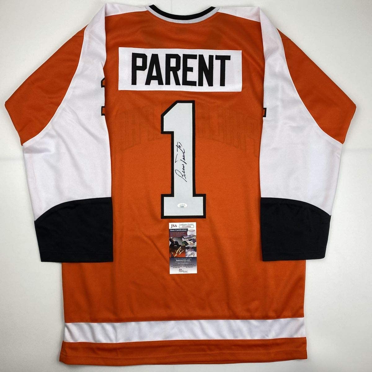 Camiseta de hockey naranja de Filadelfia autografiada/firmada por Bernie Parent (JSA COA)