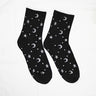2 pares de calcetines con estampado de estrellas y lunas, cómodos y transpirables, medias de tubo medio para mujer.
