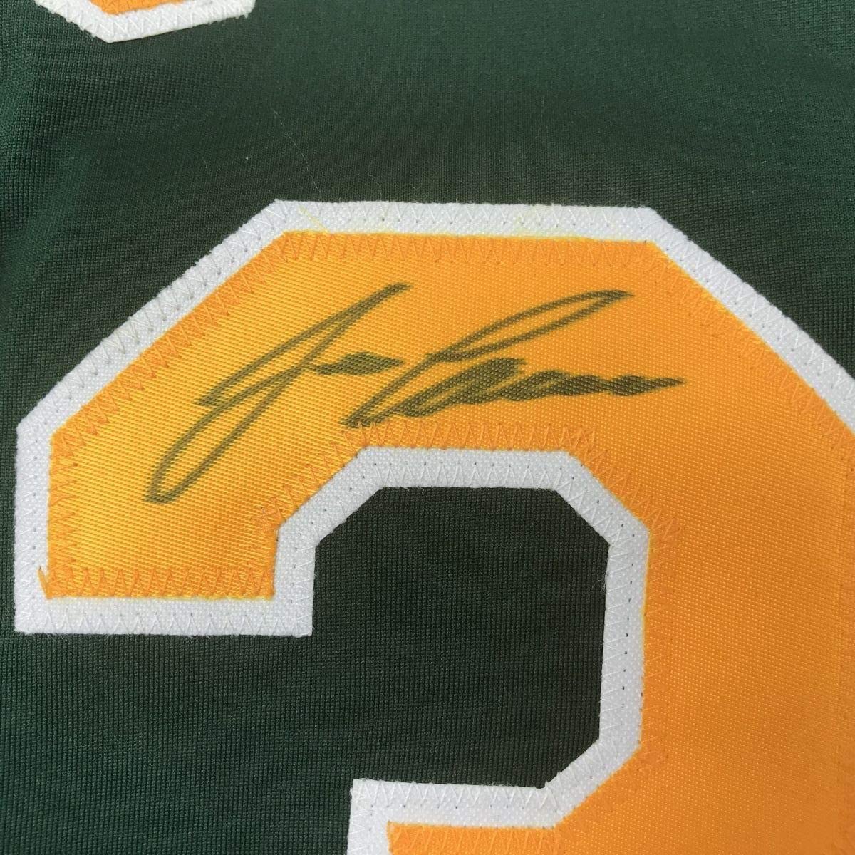 Camiseta de béisbol verde oscuro de Oakland, enmarcada, autografiada y firmada por José Canseco, 35 x 39, JSA COA
