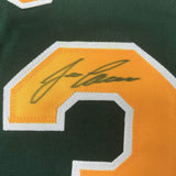 Camiseta de béisbol verde oscuro de Oakland, enmarcada, autografiada y firmada por José Canseco, 35 x 39, JSA COA