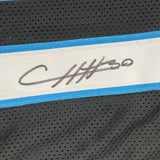 Camiseta de fútbol americano enmarcada, autografiada y firmada por Chuba Hubbard, 35 x 39, Carolina Black, Beckett BAS COA