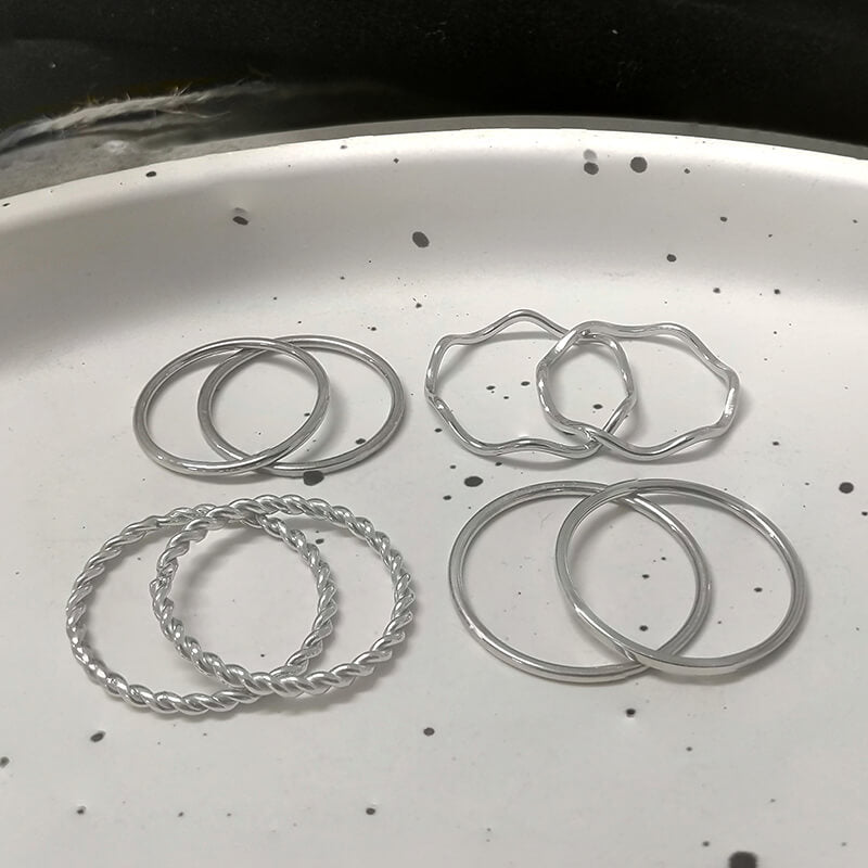 Juego de 8 anillos minimalistas de acero inoxidable