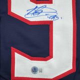 Camiseta de hockey azul de Columbus de 35 x 39, enmarcada, autografiada y firmada por Elvis Merzlikins, Beckett BAS COA