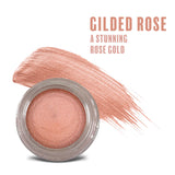 Crema Gilded Rose Any Wear: Un producto multiusos, resistente al agua, que se transforma en crema y polvo para ojos, mejillas y labios. Se puede usar en cualquier lugar.