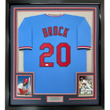 Framed Autographed/Signed Lou Brock 35x39 St. Louis Blue Baseball Jersey JSA COA