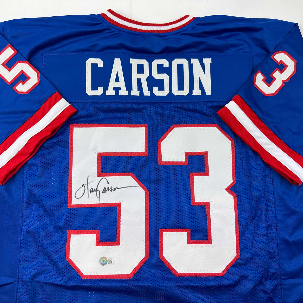 Camiseta de fútbol azul de Nueva York autografiada/firmada de Harry Carson Beckett BAS COA