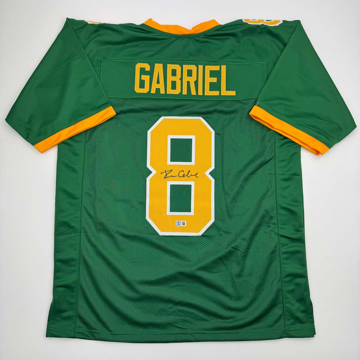 Camiseta de fútbol americano universitario autografiada/firmada por Dillon Gabriel Oregon Green Beckett BAS COA