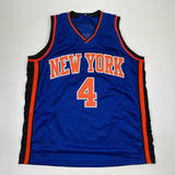 Autographed/Signed Nate Robinson New York Blue Basketball Jersey Beckett BAS COA