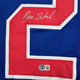 Camiseta de hockey azul autografiada/firmada de Buzz Schneider del equipo estadounidense Miracle On Ice de los Juegos Olímpicos de 1980, Beckett BAS COA