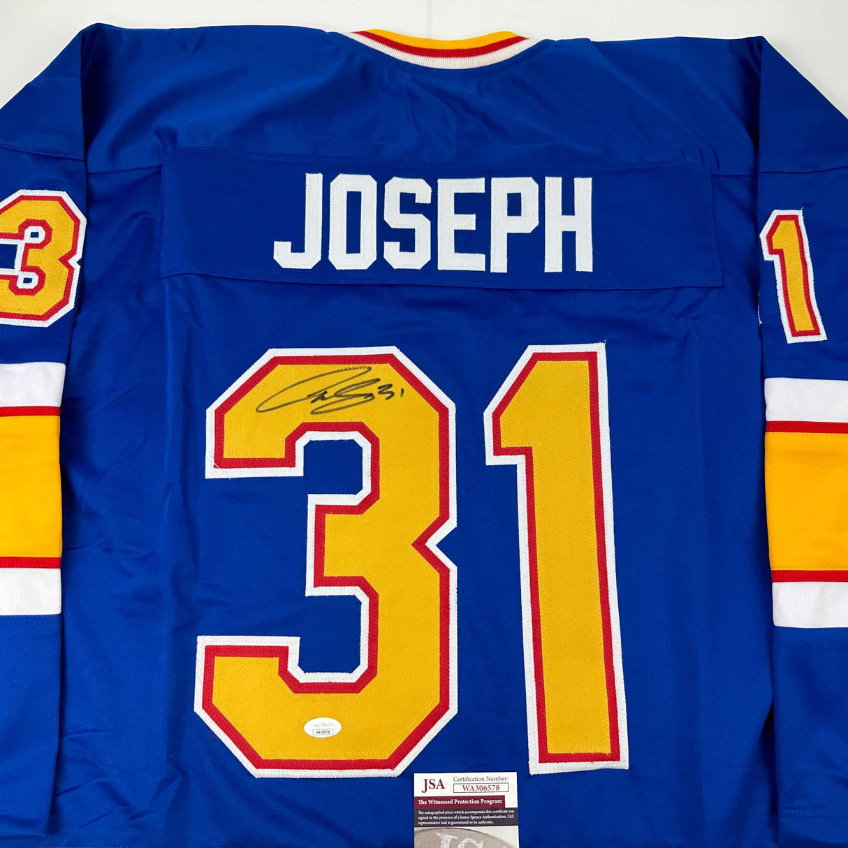 Camiseta de hockey azul de St. Louis de Curtis Joseph autografiada y firmada por JSA COA
