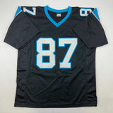 Autographed/Signed Muhsin Muhammad Carolina Black Football Jersey Beckett BAS COA