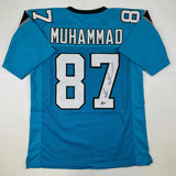 Camiseta de fútbol azul Carolina de Muhsin Muhammad autografiada/firmada Beckett BAS COA
