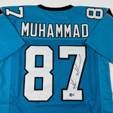 Camiseta de fútbol azul Carolina de Muhsin Muhammad autografiada/firmada Beckett BAS COA