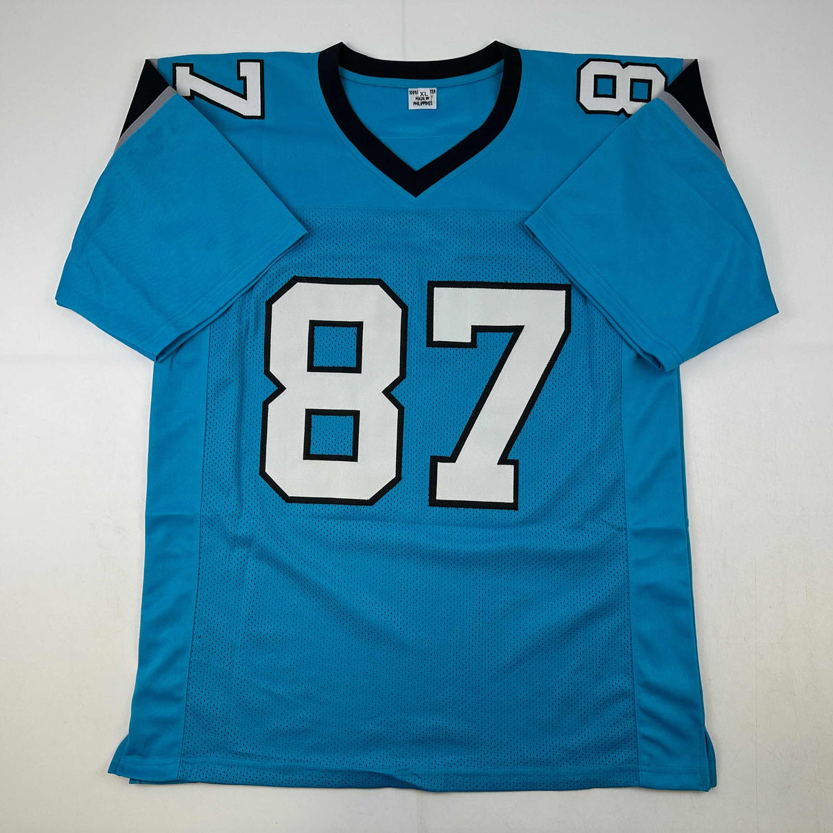 Camiseta de fútbol azul Carolina de Muhsin Muhammad autografiada/firmada Beckett BAS COA