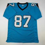 Camiseta de fútbol azul Carolina de Muhsin Muhammad autografiada/firmada Beckett BAS COA