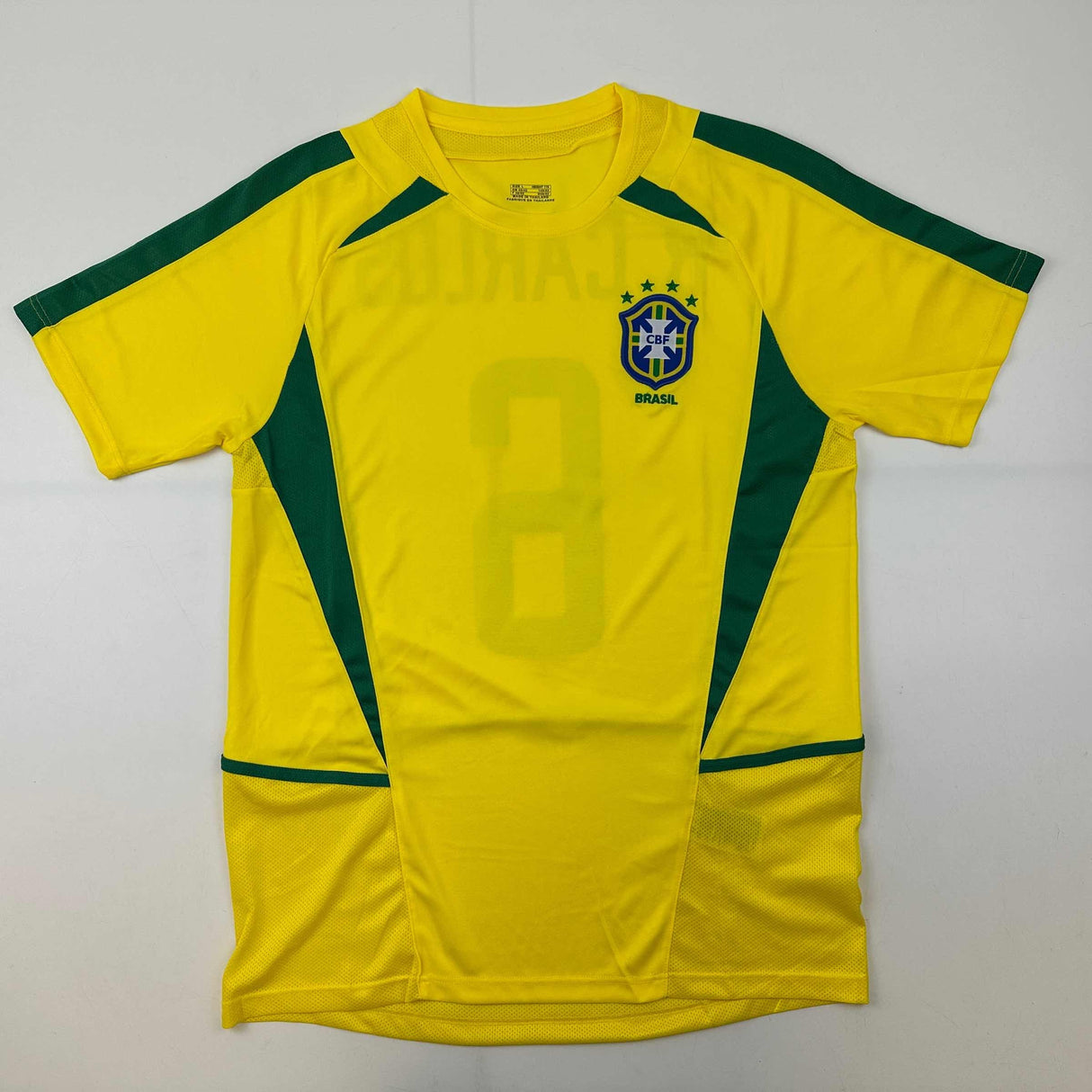 Camiseta de fútbol amarilla de Brasil autografiada/firmada de Roberto Carlos Beckett BAS COA
