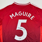Camiseta de fútbol roja del Manchester United autografiada/firmada por Harry Maguire Beckett BAS COA