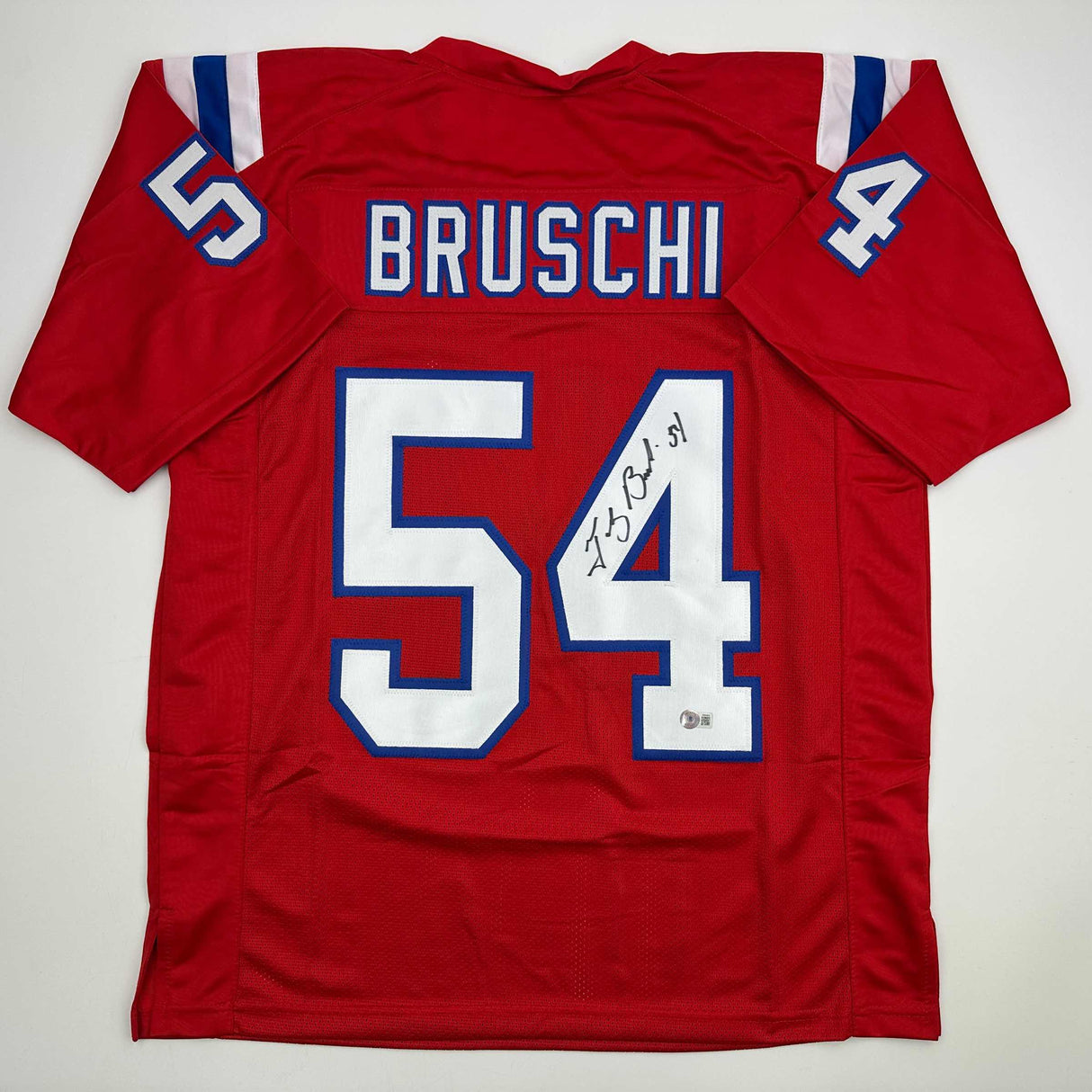Camiseta de fútbol roja de Nueva Inglaterra autografiada/firmada por Tedy Bruschi Beckett BAS COA