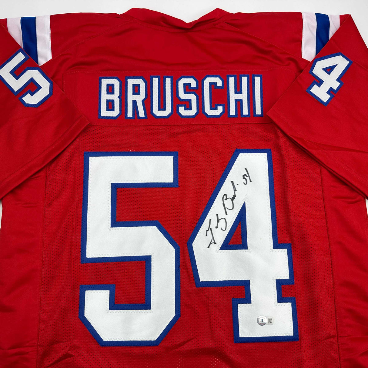 Camiseta de fútbol roja de Nueva Inglaterra autografiada/firmada por Tedy Bruschi Beckett BAS COA