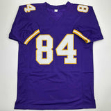 Camiseta de fútbol morado de Minnesota de Randy Moss autografiada y firmada por Beckett BAS COA