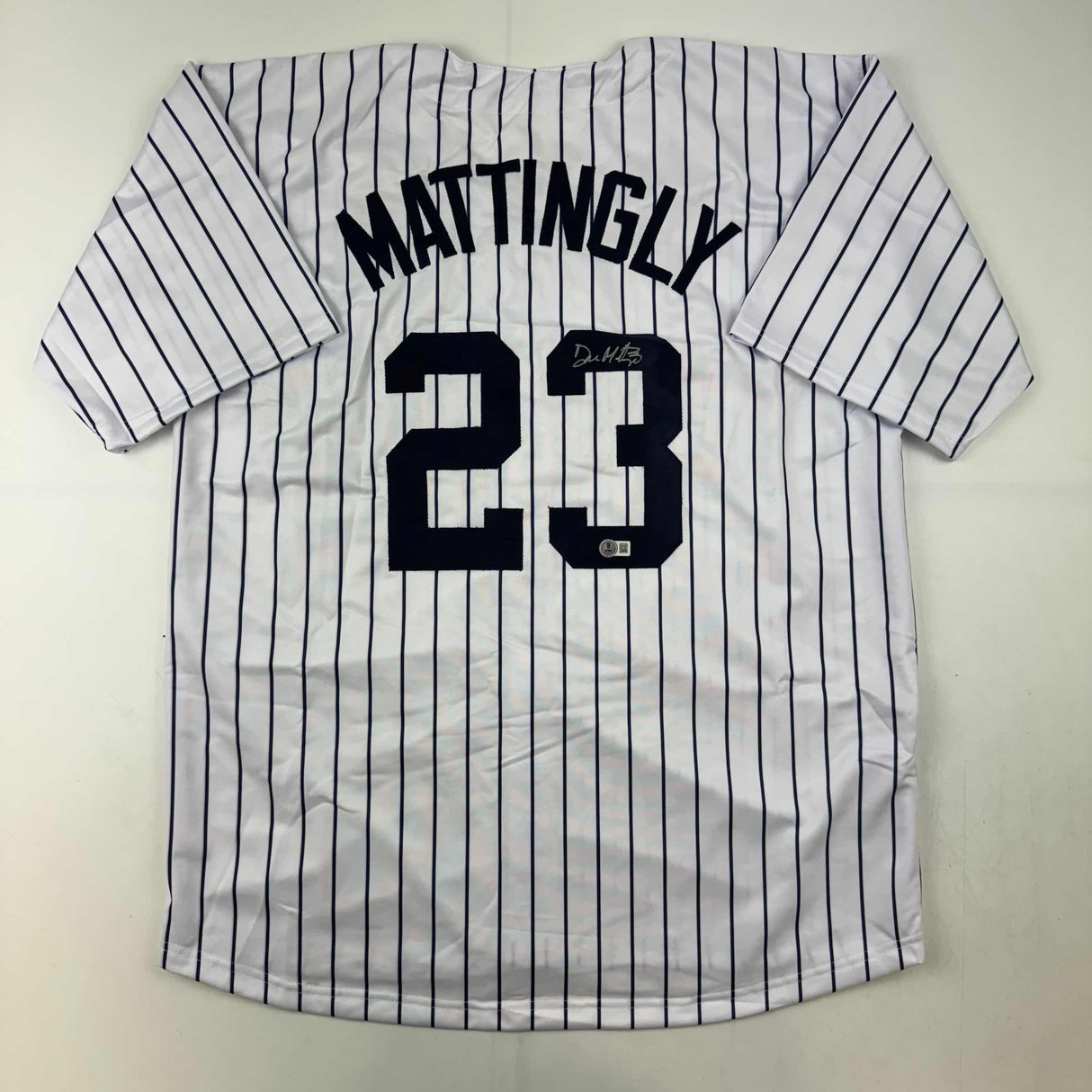 Autographed/Signed Don Mattingly New York Pinstripe Baseball Jersey Beckett BAS COA