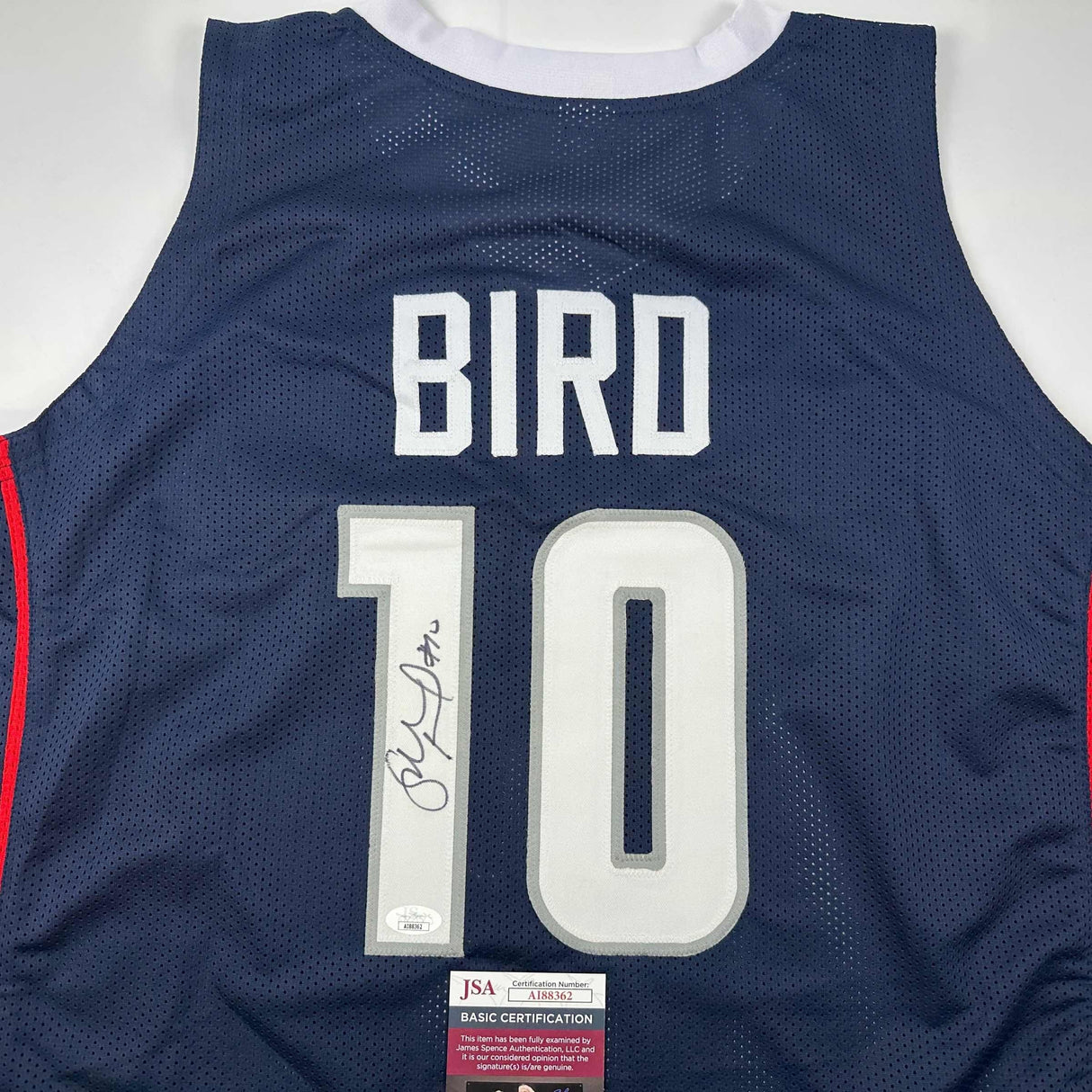 Camiseta de baloncesto universitaria azul de Connecticut de UConn autografiada/firmada por Sue Bird (JSA COA) 