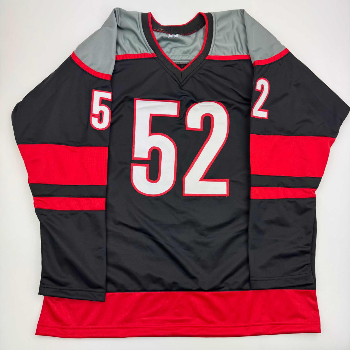 Camiseta de hockey negra Carolina de Pyotr Kochetkov autografiada/firmada JSA COA