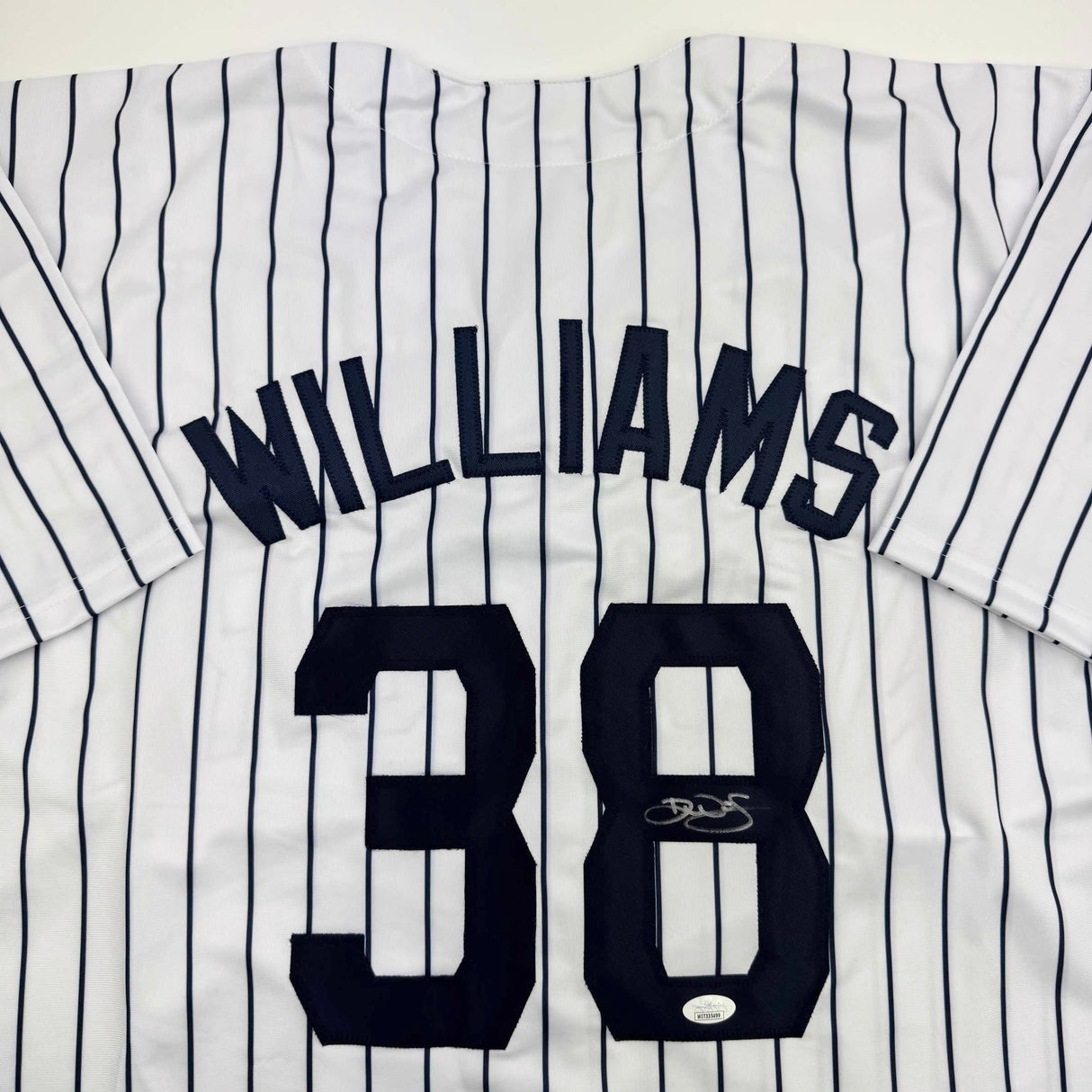 Camiseta de béisbol a rayas de Nueva York autografiada/firmada por Devin Williams (JSA COA)