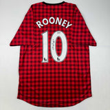 Camiseta de fútbol a cuadros roja del Manchester United autografiada/firmada por Wayne Rooney Beckett BAS COA