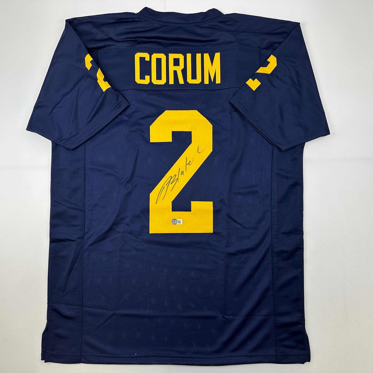 Camiseta de fútbol americano universitario azul de Michigan de Blake Corum autografiada/firmada Beckett BAS COA