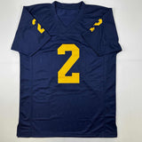 Camiseta de fútbol americano universitario azul de Michigan de Blake Corum autografiada/firmada Beckett BAS COA