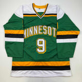 Camiseta de hockey verde de Minnesota de Mike Modano autografiada/firmada Beckett BAS COA