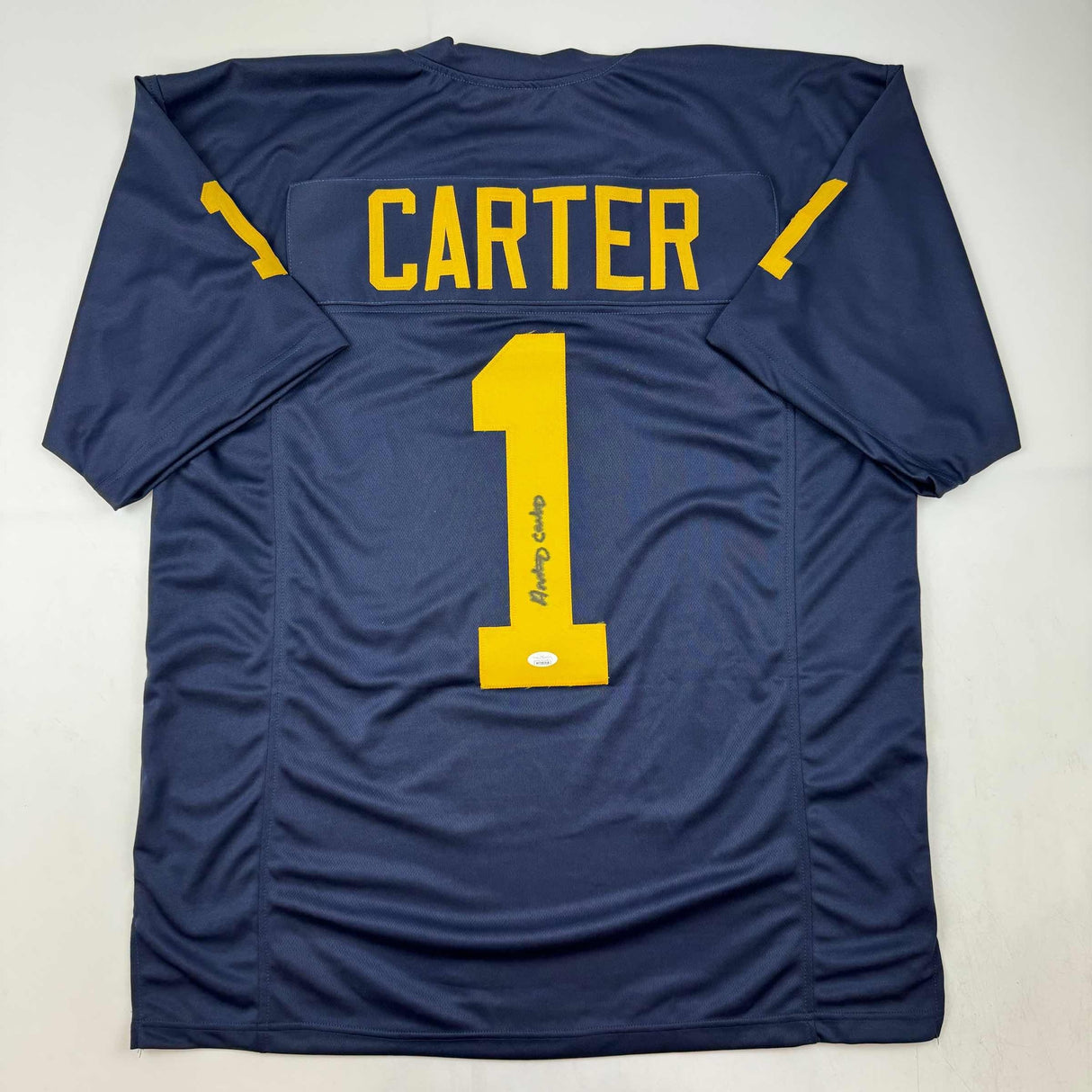 Camiseta de fútbol americano universitario azul de Michigan autografiada/firmada por Anthony Carter (JSA COA)