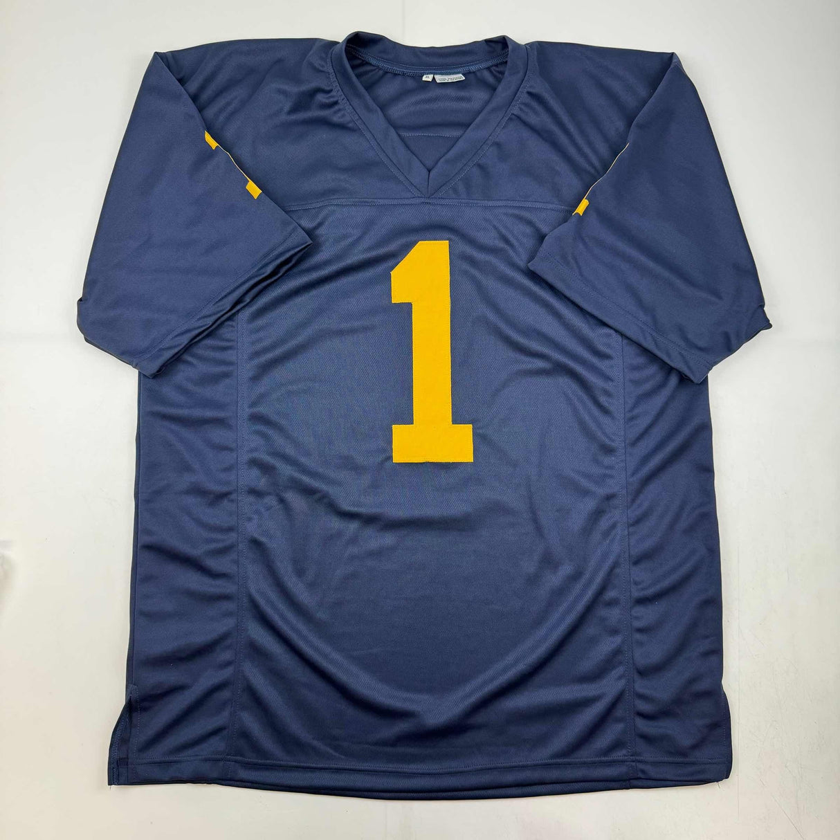 Camiseta de fútbol americano universitario azul de Michigan autografiada/firmada por Anthony Carter (JSA COA)