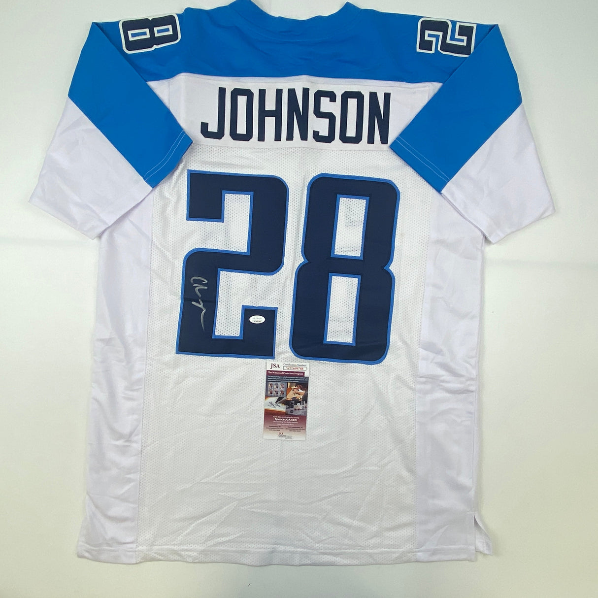 Camiseta de fútbol americano blanca de Tennessee de Chris Johnson autografiada/firmada JSA COA